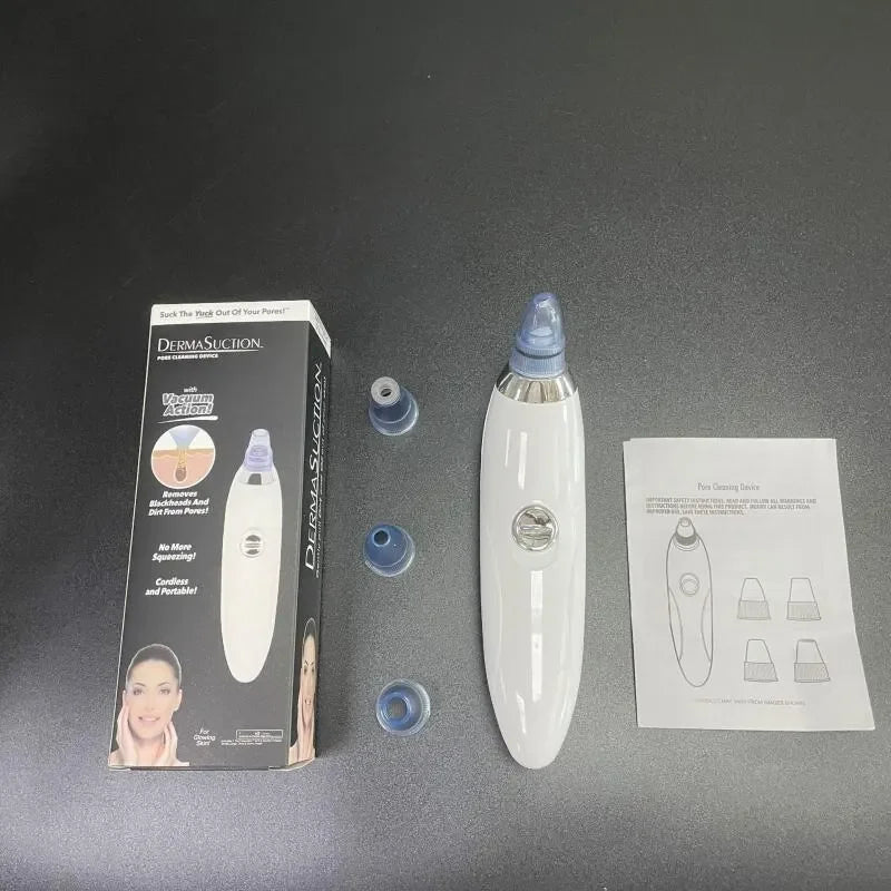 Kit removedor de cravos DermaSuction branco com ponteiras e manual sobre mesa preta
