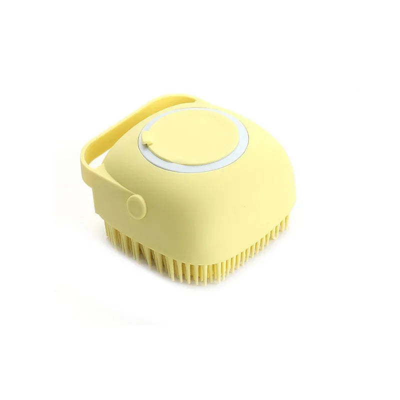 Escova de silicone amarela para banho de pets com cerdas macias e alça prática