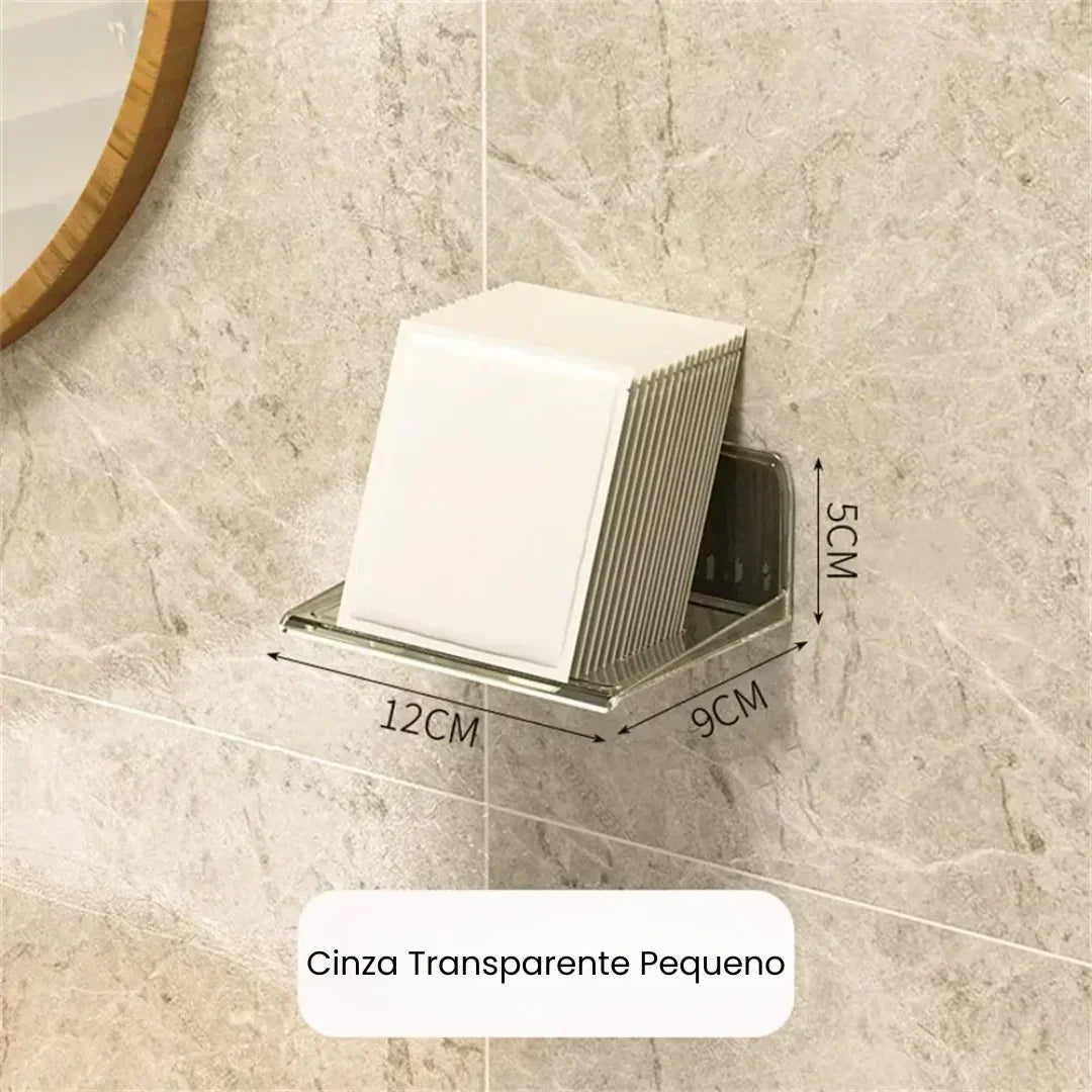 Porta guardanapos cinza transparente pequeno fixado na parede de banheiro com dimensão 12x9x5cm