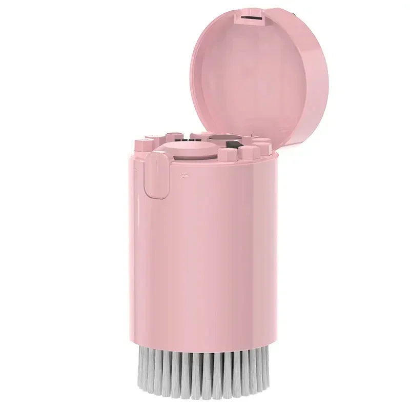 Escova de limpeza multifuncional rosa com tampa aberta e cerdas brancas