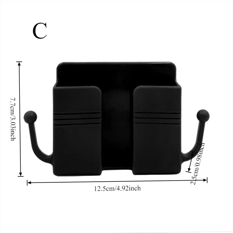 Suporte preto de parede com dois ganchos e porta-objetos, medidas visíveis em centímetros e polegadas.